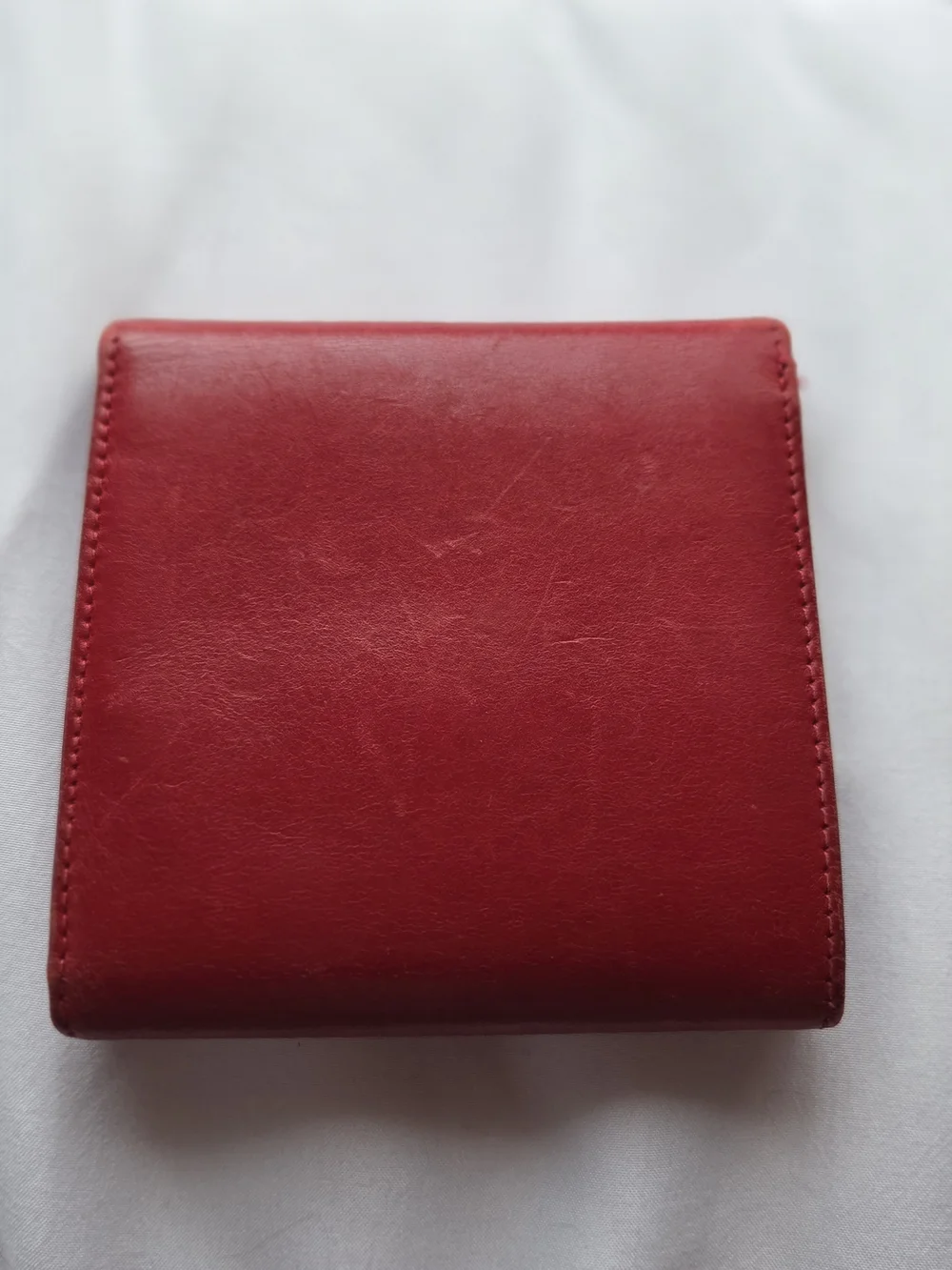 Red Leather Salvatore Ferragamo Wallet Featuring a Gold Gancini Clasp